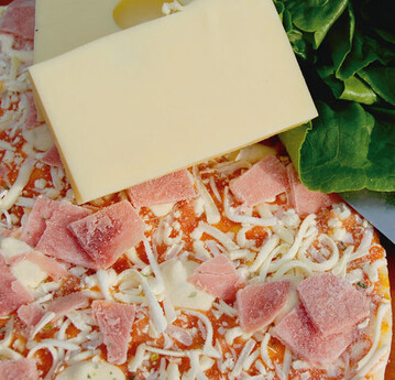 Immer hufiger findet man auf Fertigpizzen Analog-Kse